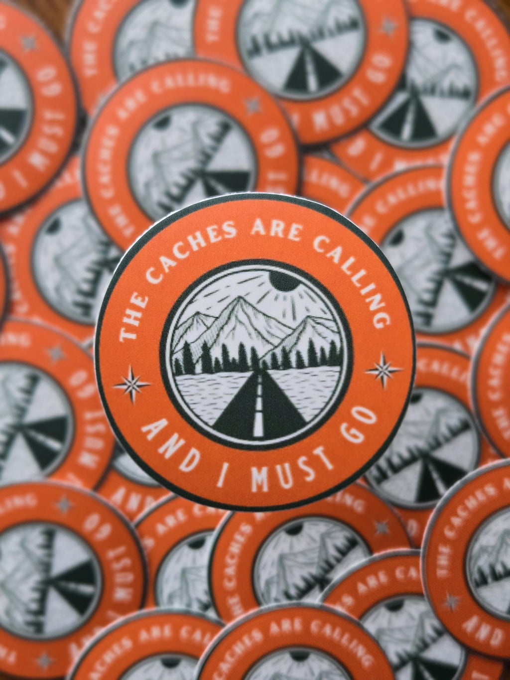 Geocaching Sticker – "The Caches Are Calling", Weatherproof Vinyl (2.5")