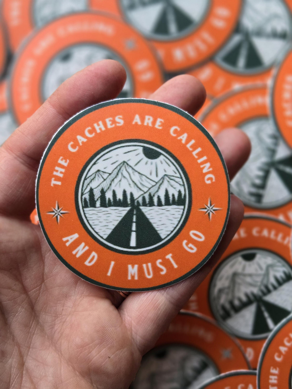 Geocaching Sticker – "The Caches Are Calling", Weatherproof Vinyl (2.5")