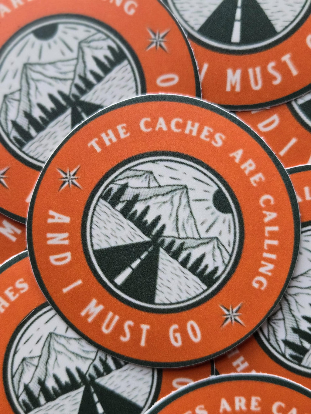 Geocaching Sticker – "The Caches Are Calling", Weatherproof Vinyl (2.5")